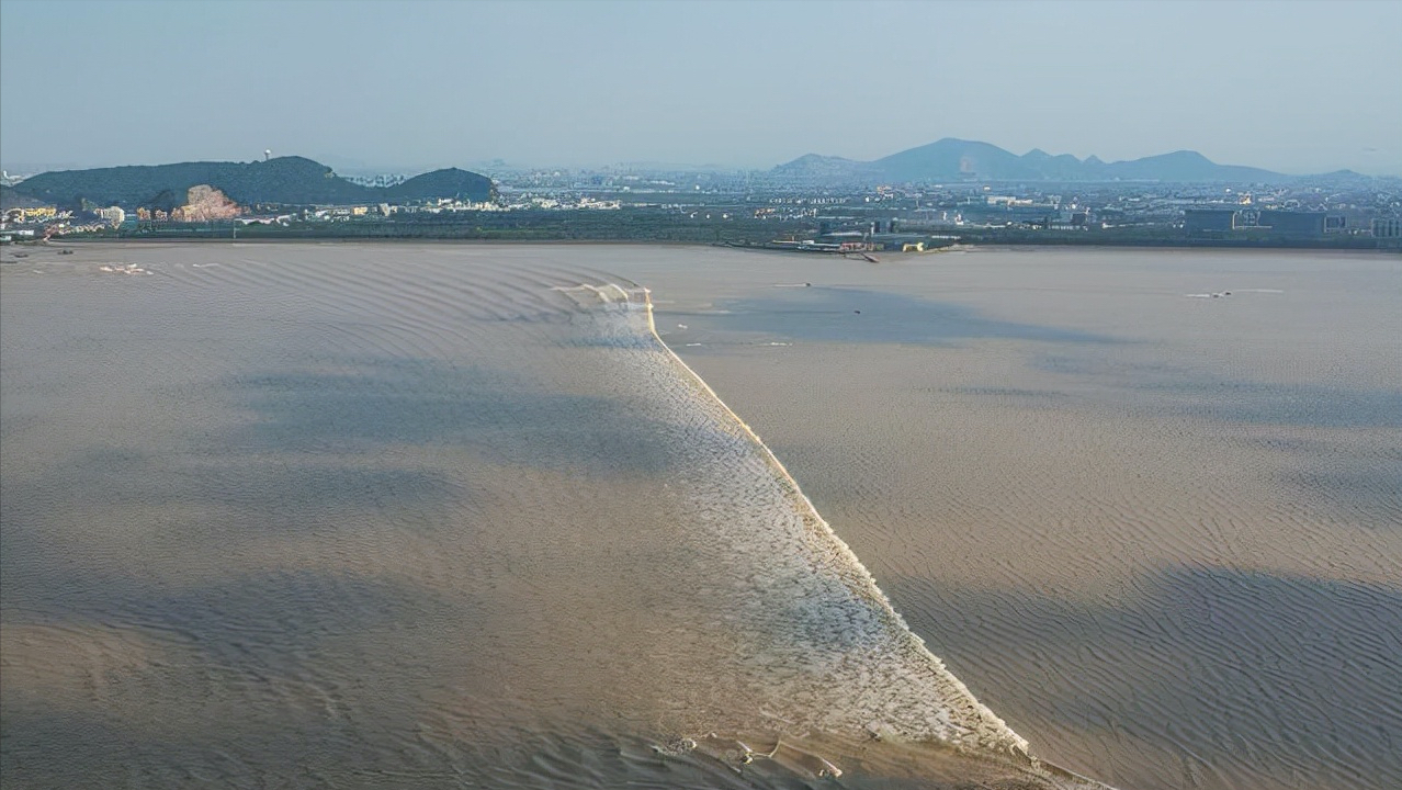 钱塘江与海，江河与海洋的交融之美_词语解释落实